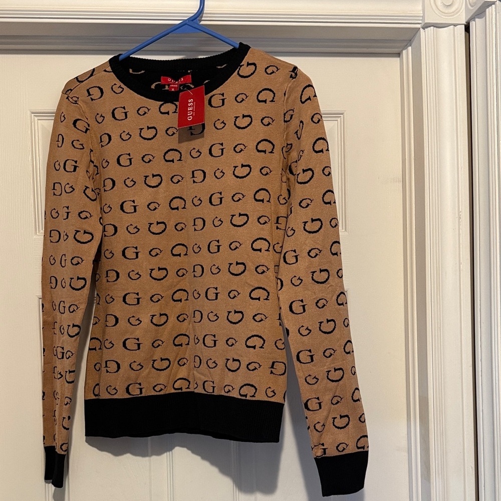 Guess sweater size XL fits smaller new with the tags